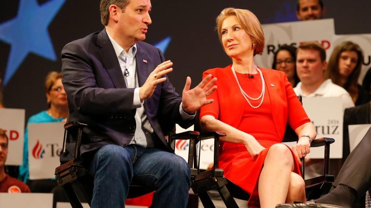 In this photo taken March 11, 2016, Republican presidential candidate, Sen. Ted Cruz, R-Texas speaks to Carly Fiorina in Orlando, Fla., Friday, March 11, 2016. According to an AP Source: Cruz has picked Fiorina as his running mate