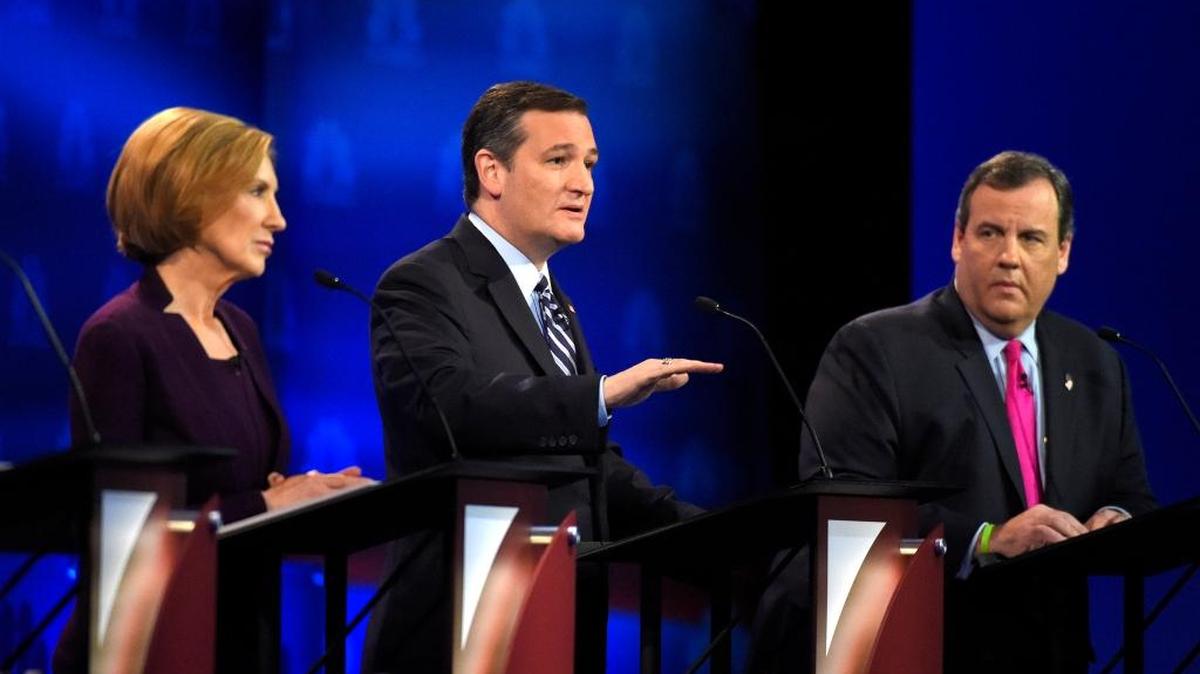 Ted Cruz, center, speaks as Carly Fiorina, left, and Chris Christie look on during the CNBC Republican presidential debate at the University of Colorado, Wednesday, Oct. 28, 2015, in Boulder, Colo.