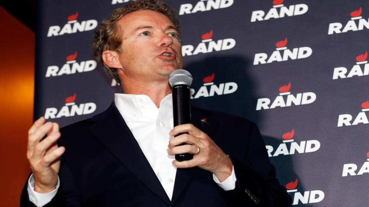 
In this photograph taken Tuesday, June 30, 2015, Republican presidential hopeful Sen. Rand Paul of Kentucky speaks during a campaign stop at a sports bar in the Cherry Creek area in Denver. 
