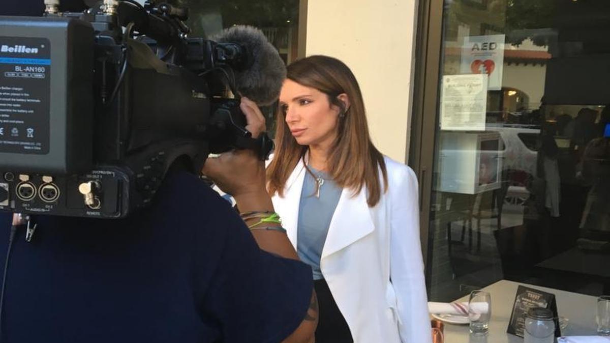 Ileana Garcia, founder of Latinas for Trump, conducts a TV interview in Coral Gables on Wednesday, June 22, 2016.