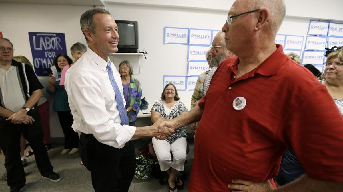 
Democratic presidential candidate, former Maryland Gov. Martin O'Malley, greets supporters during the opening of his Cedar Rapids Field Office, Wednesday, Aug. 5, 2015, in Cedar Rapids, Iowa. 
