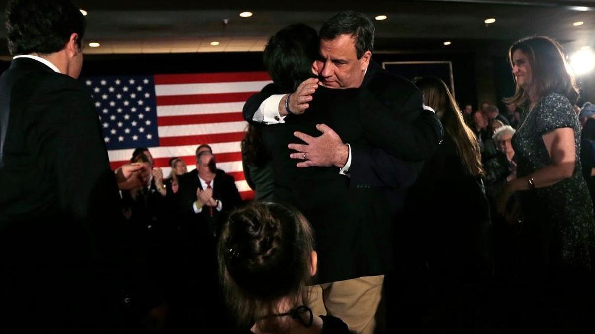 Republican presidential candidate New Jersey Gov. Chris Christie embraces his son Patrick during a primary night rally in Nashua, N.H., Tuesday. At left is Christie's older son Andrew and wife Mary Pat at right.