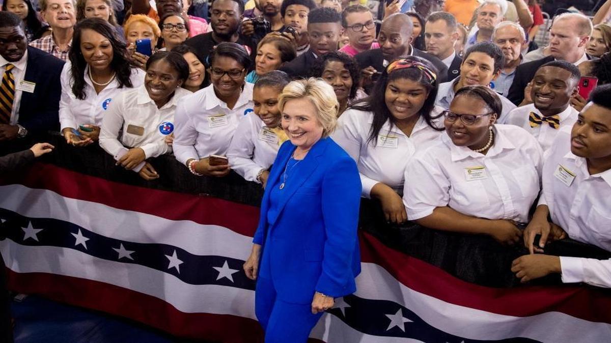 Democratic presidential candidate Hillary Clinton poses with students after she speaks at a rally at Johnson C. Smith University in Charlotte, N.C., in one of the nation’s top swing states.