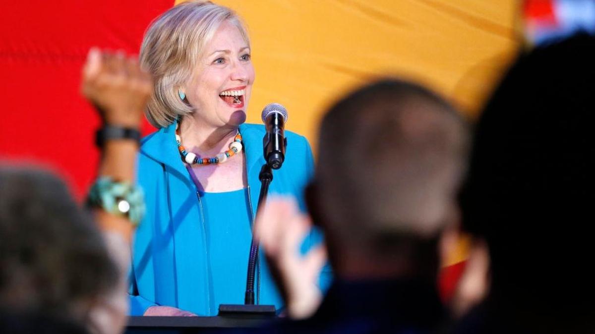 
Democratic presidential candidate Hillary Clinton greets supporters Tuesday before speaking at a campaign rally at La Rumba, a Denver dance club and restaurant.
