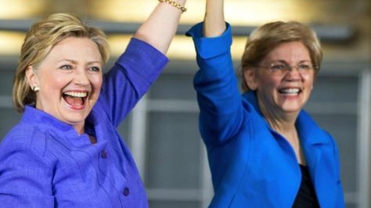 FILE - In this June 27, 2016, file photo, Democratic presidential candidate Hillary Clinton, accompanied by Sen. Elizabeth Warren, D-Mass., arrives to speak at the Cincinnati Museum Center at Union Terminal in Cincinnati. Warren is being considered as a vice presidential pick for Clinton.