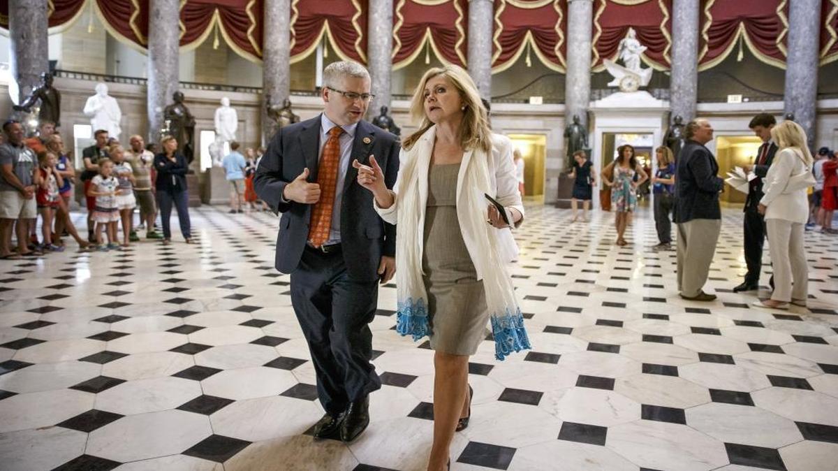 FILE – North Carolina’s Rep. Patrick McHenry is the No. 4-ranking Republican in the U.S. House. He’s the highest-ranking member of party leadership from North Carolina. Here, McHenry walks and talks with Rep. Marsha Blackburn, R-Tenn.