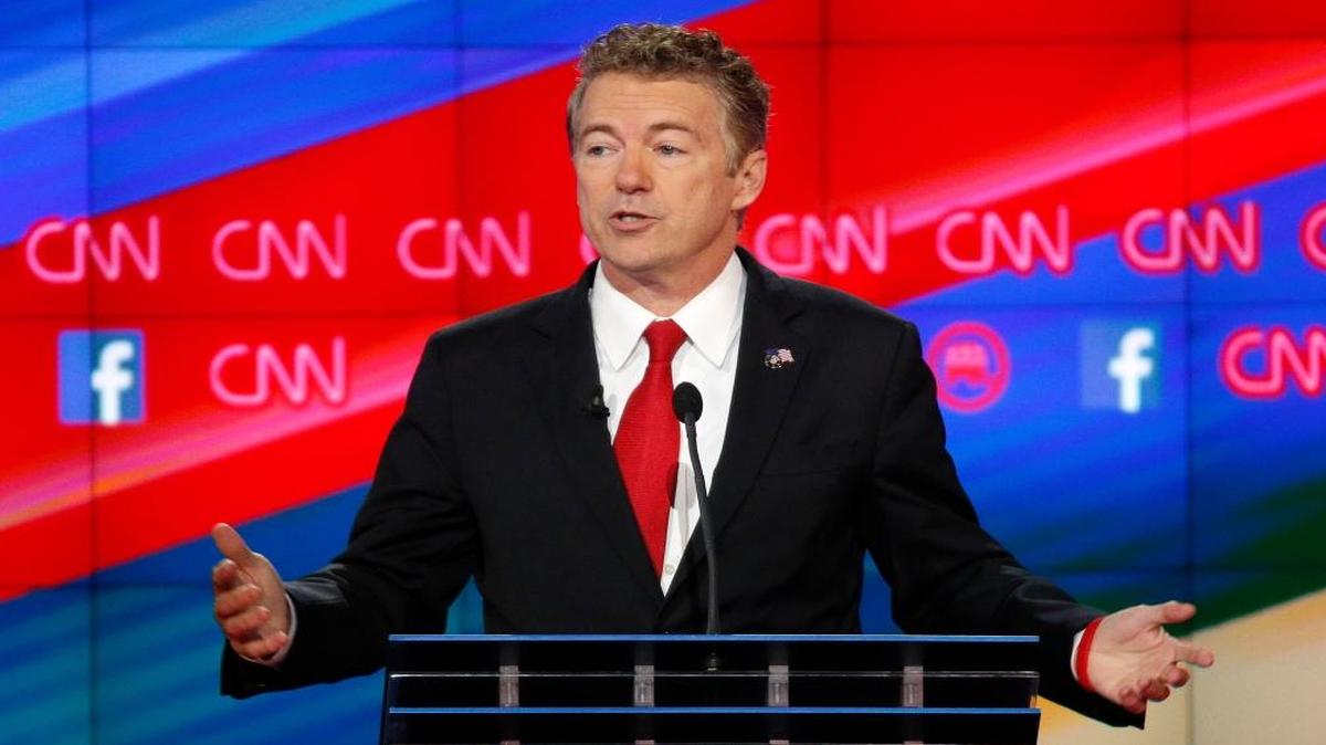Rand Paul speaks during the CNN Republican presidential debate at the Venetian Hotel & Casino on Tuesday, Dec. 15, 2015, in Las Vegas. Paul is stepping up his criticism of Sen. Marco Rubio for skipping Senate votes to run for the White House.