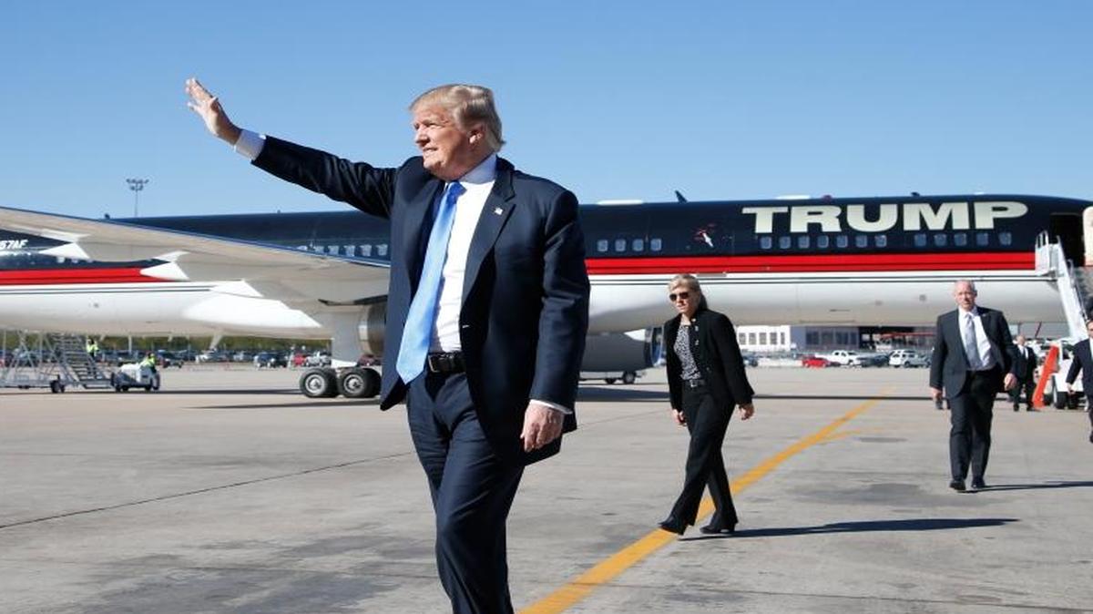 Republican presidential candidate Donald Trump arrives at a campaign rally, Wednesday, Dec. 16, 2015, in Mesa, Ariz.