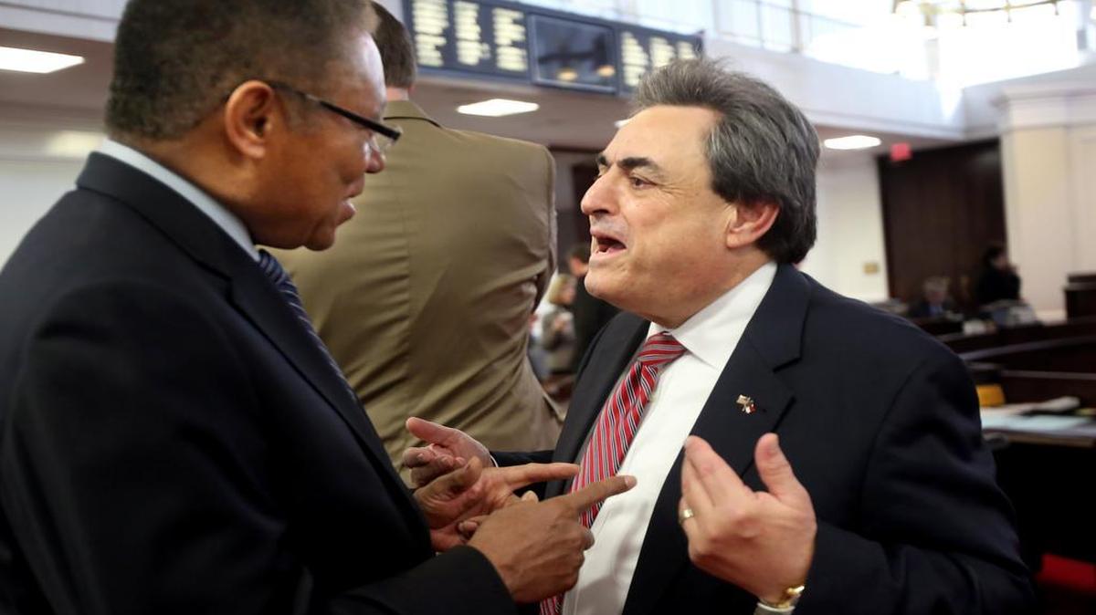 Democratic Sen. Dan Blue, left, and Republican Sen. Bob Rucho talk before a morning session of the N.C. Senate on Thursday. The legislature convened to redraw the state’s congressional map.