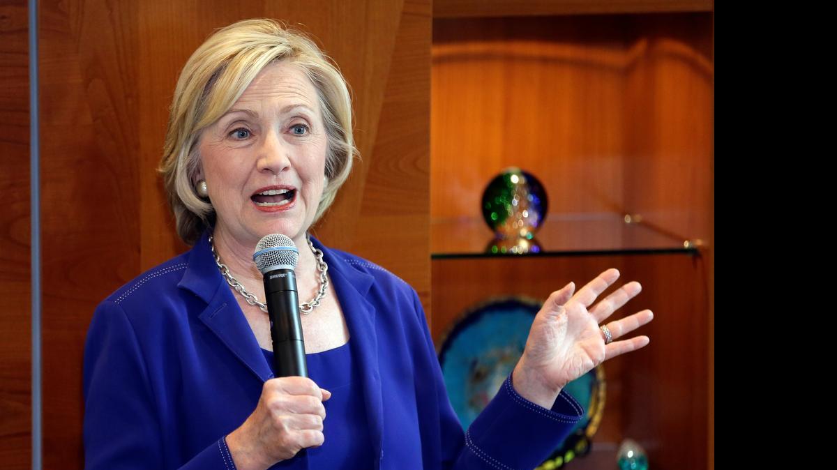 
Democratic presidential candidate Hillary Rodham Clinton speaks during a house party hosted by Nancy Emanuel, a retired nurse and former instructor at Indian Hills Community College in Ottumwa, and her husband, Dennis Emanuel, an attorney, Tuesday, July 7, 2015, in Ottumwa, Iowa. 
