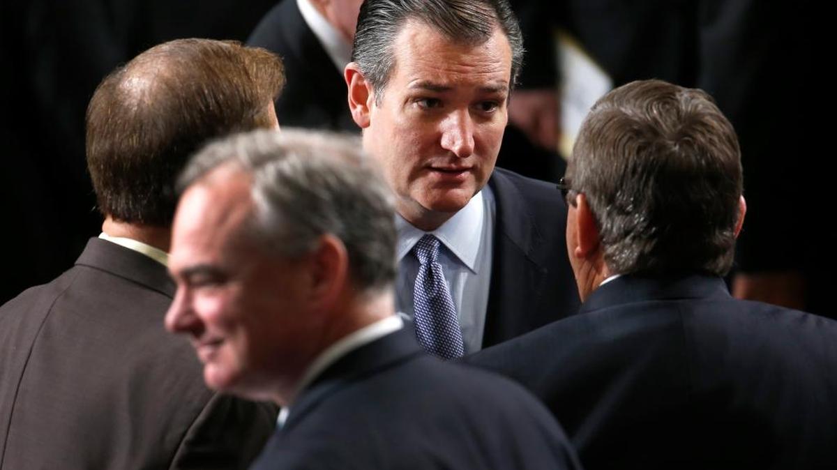 
Republican Presidential candidate Sen. Ted Cruz, R-Tex. talks with fellow members on Capitol Hill in Washington, Thursday.
