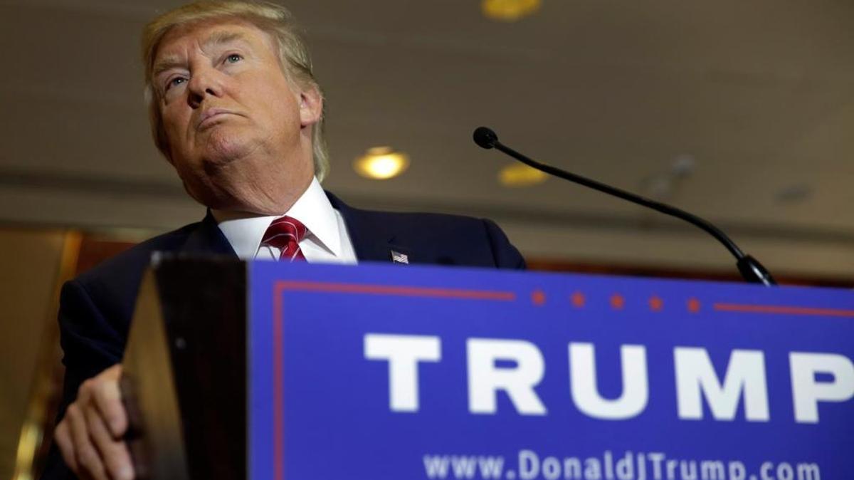 
Republican presidential candidate Donald Trump listens to a question at a news conference at Trump Tower, in New York, Thursday, Sept. 3, 2015. 
