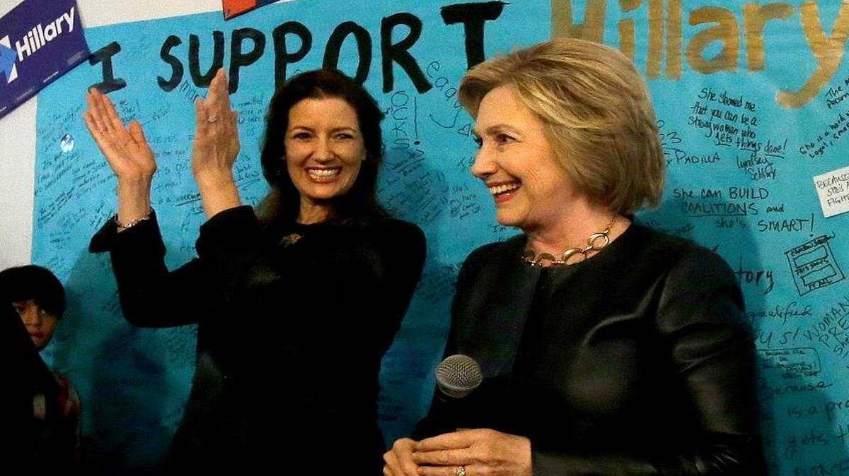 Democratic presidential candidate Hillary Clinton, right, smiles next to Oakland Mayor Libby Schaaf at Clinton's campaign field office in Oakland, Calif., Friday, May 6, 2016.