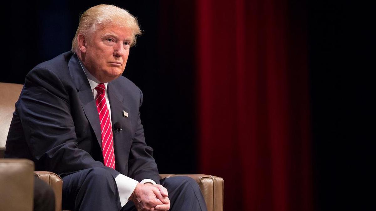 
Donald Trump pauses while speaking during the Family Leadership Summit in Ames, Iowa. He’s likely to be center stage, literally and figuratively, during Thursday’s Republican presidential debate.
