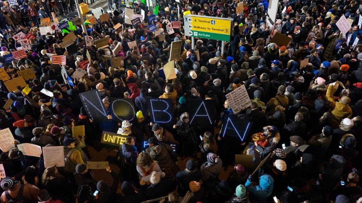 Protesters assemble at John F. Kennedy International Airport in New York, Saturday, Jan. 28, 2017, after earlier in the day two Iraqi refugees were detained while trying to enter the country.