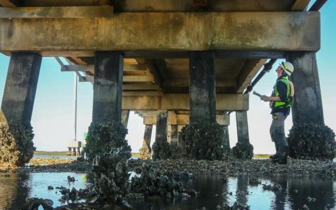 The President-elect campaigned on rebuilding America’s roads and bridges. Whether he can get his plan passed might have a lot to do with Congressional conservatives, such as those from South Carolina. Here, Keith Werner, with HDR Inc., inspects the Harbor River Bridge as part of an annual inspection that happened to coincide with Hurricane Matthew.