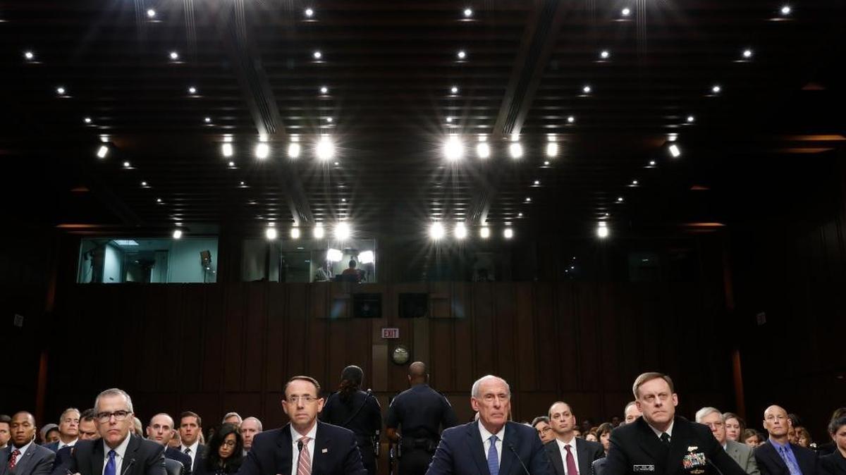 From left, Acting FBI Director Andrew McCabe, Deputy Attorney General Rod Rosenstein, National Intelligence Director Dan Coats, and National Security Agency Director Adm. Michael Rogers are seated during a Senate Intelligence Committee hearing about the Foreign Intelligence Surveillance Act, on Capitol Hill, Wednesday, June 7, 2017, in Washington.