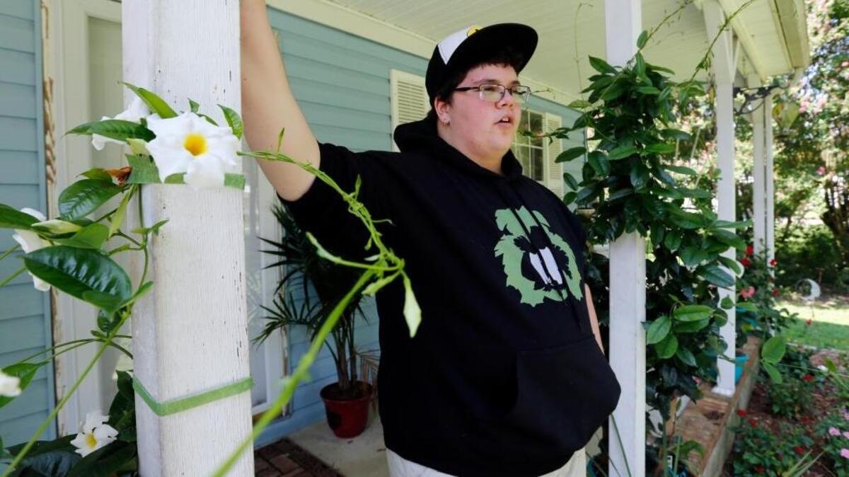 In this Aug. 25, 2015 file photo, Gavin Grimm is interviewed at his home in Gloucester, Va. Grimm is a transgender student whose demand to use the boys' restrooms has divided the community and prompted a lawsuit.