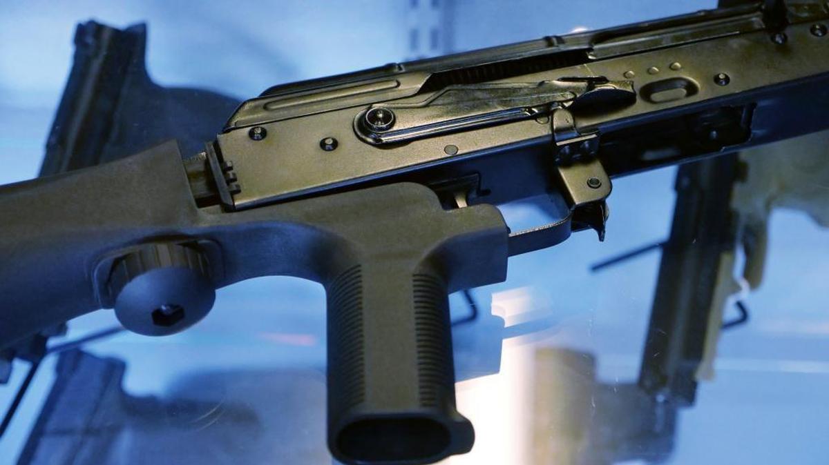 A little-known device called a "bump stock" is attached to a semi-automatic rifle at the Gun Vault store and shooting range Wednesday, Oct. 4, 2017, in South Jordan, Utah. Las Vegas shooter Stephen Paddock bought 33 guns within the last year, but that didn't raise any red flags. Neither did the mountains of ammunition he was stockpiling, or the bump stocks found in his hotel room that allow semi-automatic rifles to mimic fully automatic weapons.