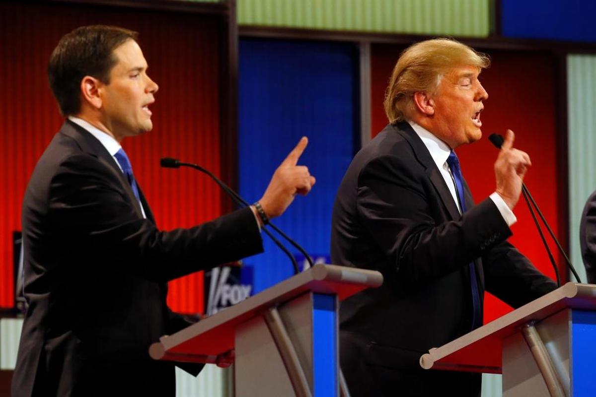 Sen. Marco Rubio, R-Fla., and then-candidate Donald Trump argue during a Republican presidential primary debate at Fox Theatre, Thursday, March 3, 2016, in Detroit.