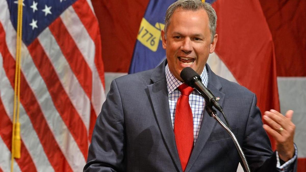 NC Lt. Governor Dan Forest speaks to the audience before Mike Pence, then the Republican candidate for vice president, takes the stage during a town meeting event at the Fletcher Opera Theater at the Duke Energy Center for the Performing Arts in Raleigh on August 4, 2016.