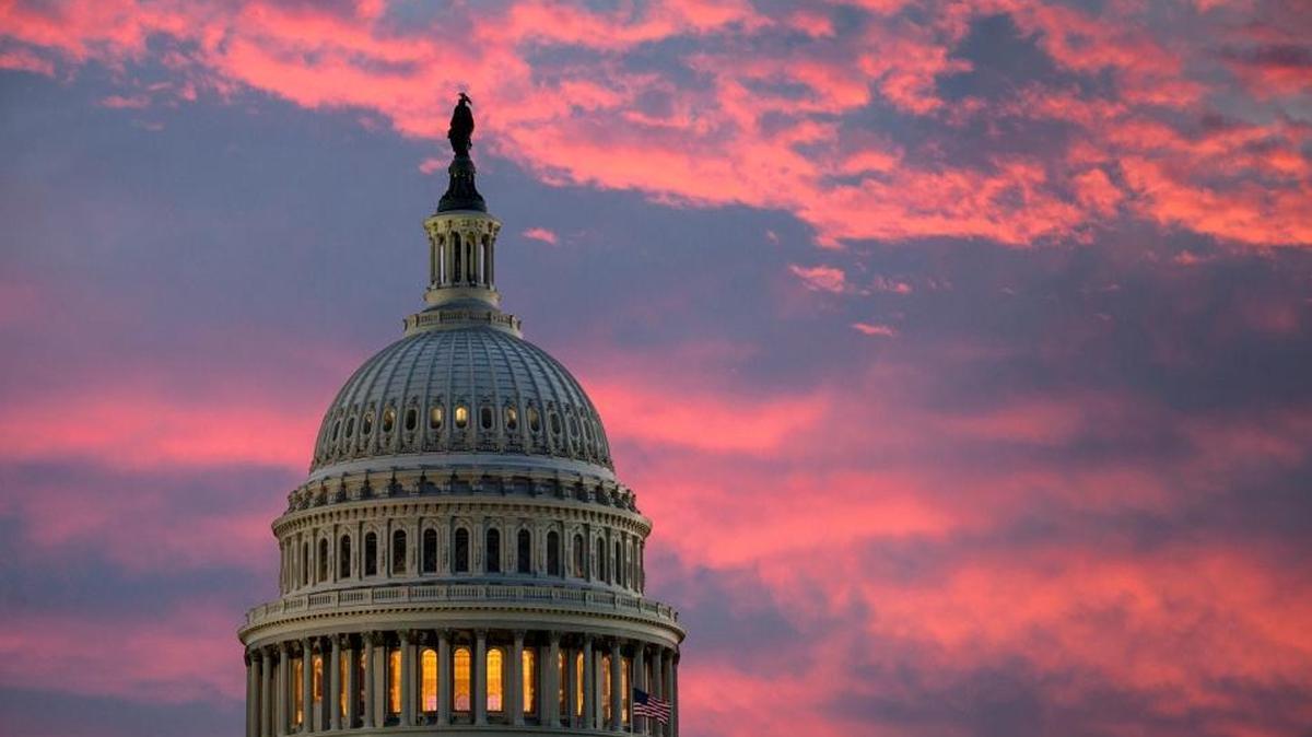 The Capitol is seen at dawn as Senate Republicans work to pass their sweeping tax bill this week.
