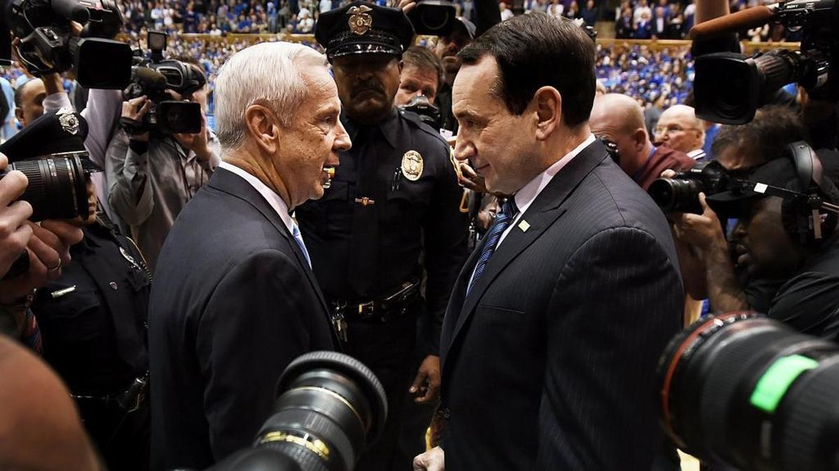 Duke head coach Mike Krzyzewski (right) and North Carolina head coach Roy Williams greet each other prior to their game at Cameron Indoor Stadium. Duke beat North Carolina 92-90 in overtime in Durham, NC Wednesday, Feb. 18, 2017.