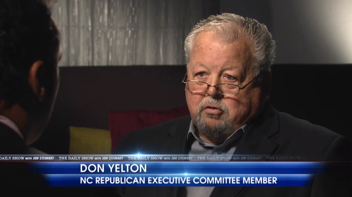 In this screen grab from a “The Daily Show” interview, correspondent Aasif Mandvi talks with Don Yelton, a North Carolina Republican and former Buncombe County GOP precinct chair. Yelton made controversial remarks about the intent behind North Carolina’s voter ID law in a Daily Show segment that aired on Comedy Central on Wednesday, Oct. 24, 2013.