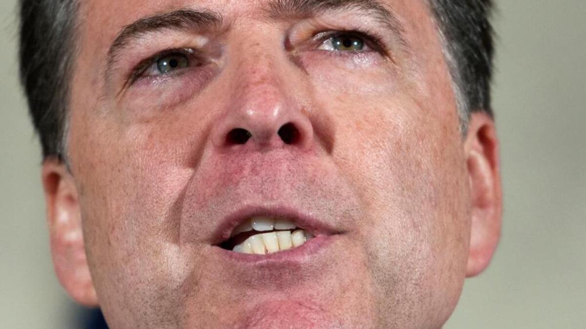 FBI Director James Comey makes a statement at FBI Headquarters in Washington, Tuesday, July 5, 2016.