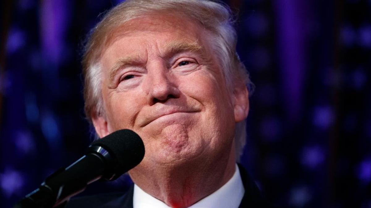 President-elect Donald Trump smiles as he arrives to speak at an election night rally, Wednesday, Nov. 9, 2016, in New York.