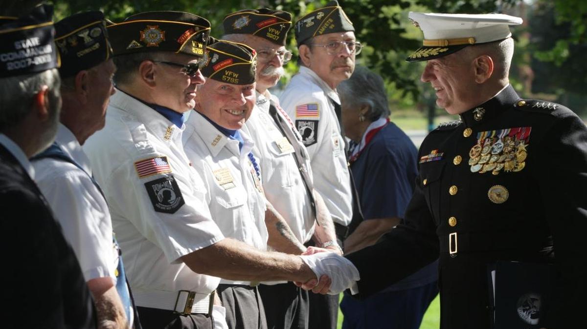 Gen. James Mattis, commander of the U.S. Central Command in Tampa, Fla., greets veterans in 2012 prior to the Time of Remembrance ceremony at Flat Top Park in West Richland. The event honored men and women who have died fighting the war on terrorism in Iraq and Afghanistan.