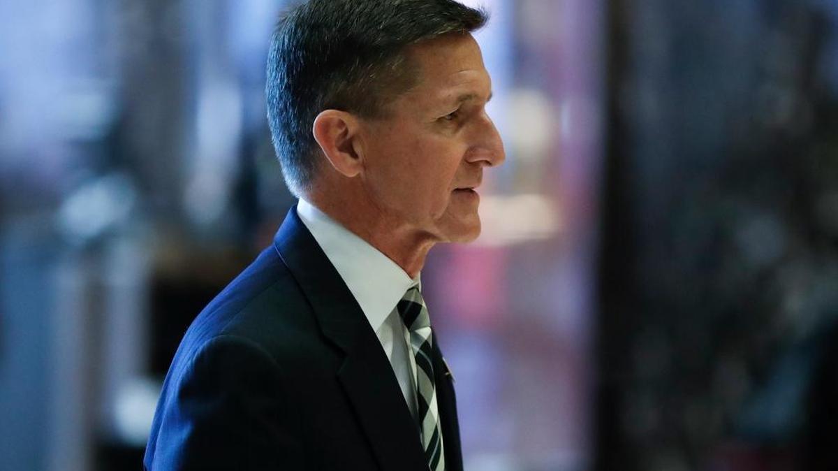 Retired Lt. Gen Michael Flynn walks through the lobby at Trump Tower, Thursday, Nov. 17, 2016, in New York.