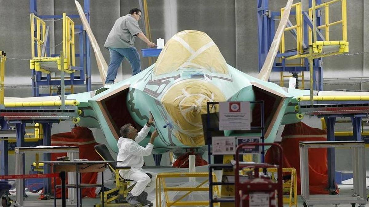 An F-35 is masked for the final finish coatings at Lockheed Martin Aeronautics in Fort Worth.