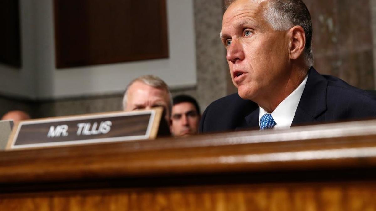 Senate Armed Services Committee member Thom Tillis of North Carolina questions Navy Secretary nominee Richard Spencer on Capitol Hill in Washington, July 11, 2017, during Spencer's confirmation hearing before the committee.