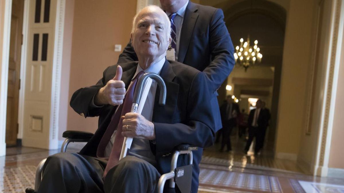 Dec. 1, 2017: Sen. John McCain, R-Ariz., leaves a closed-door session where Republican senators met on the GOP effort to overhaul the tax code.