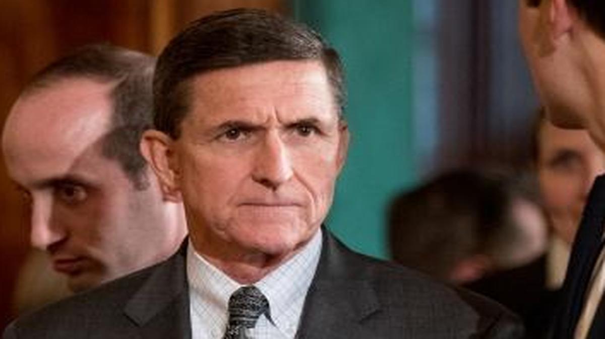 National Security Adviser Michael Flynn, center, arrives in the East Room of the White House in Washington, Monday, Feb. 13, 2017, prior to the start of a joint news conference with President Donald Trump and Canadian Prime Minister Justin Trudeau.