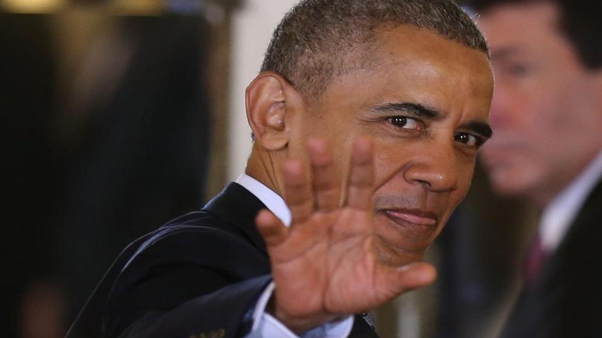 U.S. President Barack Obama salutes as he enter the government house in Buenos Aires, Argentina, Wednesday, March 23, 2016. Obama is on a two day official visit to Argentina. It is the first visit to Argentina by a U.S. president since George W. Bush came here in 2005.