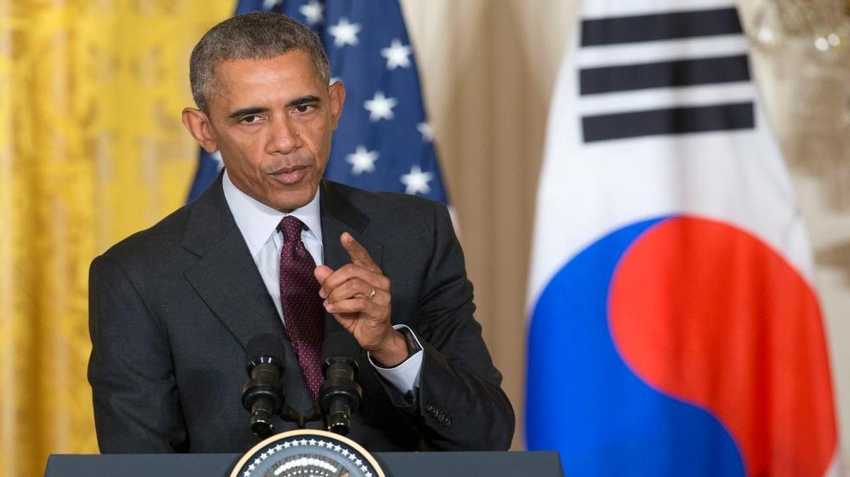 
President Barack Obama gestures while answering questions during a joint news conference with South Korean President Park Geun-hye in the East Room of the White House in Washington, Friday, Oct. 16, 2015. 
