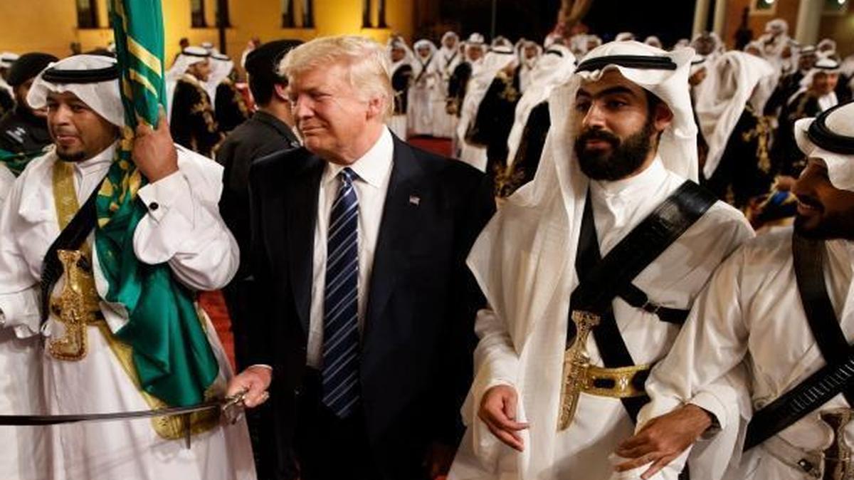 President Donald Trump took part in a traditional dance during the Saudi ceremony welcoming him to Riyadh May 20.