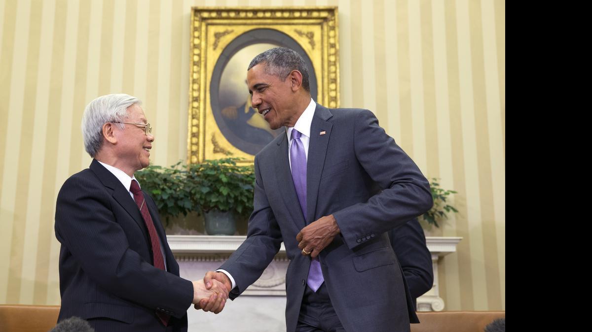 
President Barack Obama, right, meets with Vietnamese Communist party secretary general Nguyen Phu Trong in the Oval Office of the White House, on Tuesday, July 7, 2015, in Washington. Trong is the de facto leader of Vietnam despite holding no official government post, and is visiting Washington to boost ties 20 years after the U.S. and Vietnam normalized relations following the Vietnam War. 
