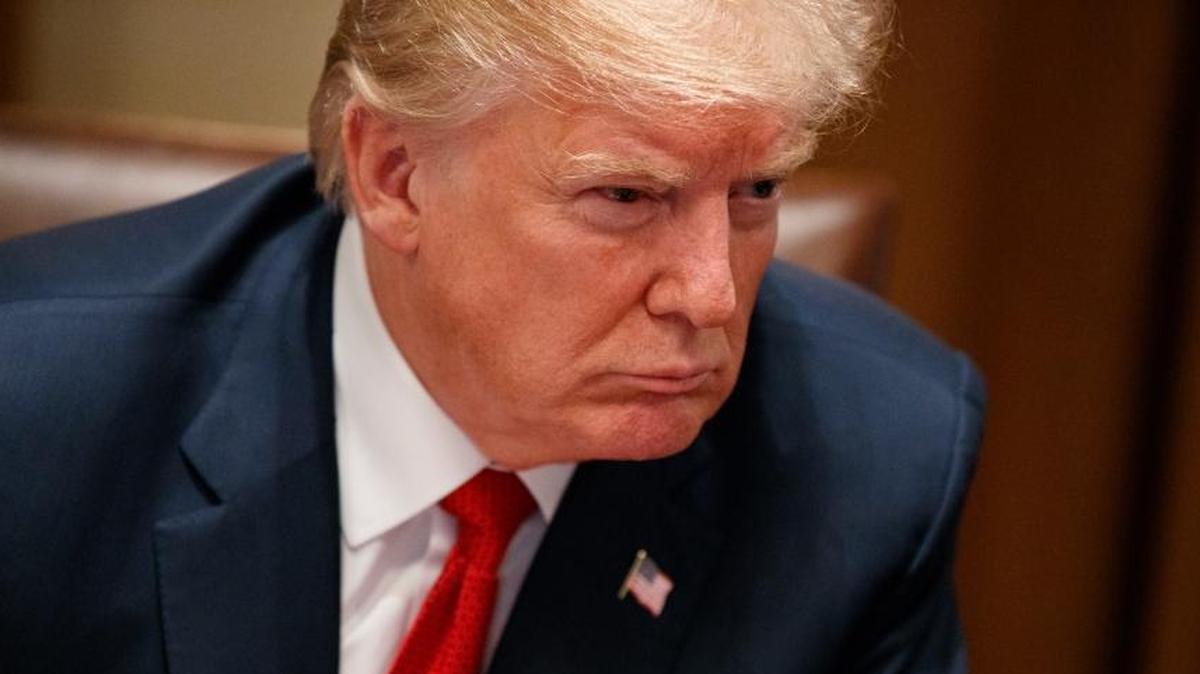 President Donald Trump listens during a meeting with law enforcement officials on the MS-13 street gang and border security, in the Cabinet Room of the White House, Tuesday, Feb. 6, 2018, in Washington.