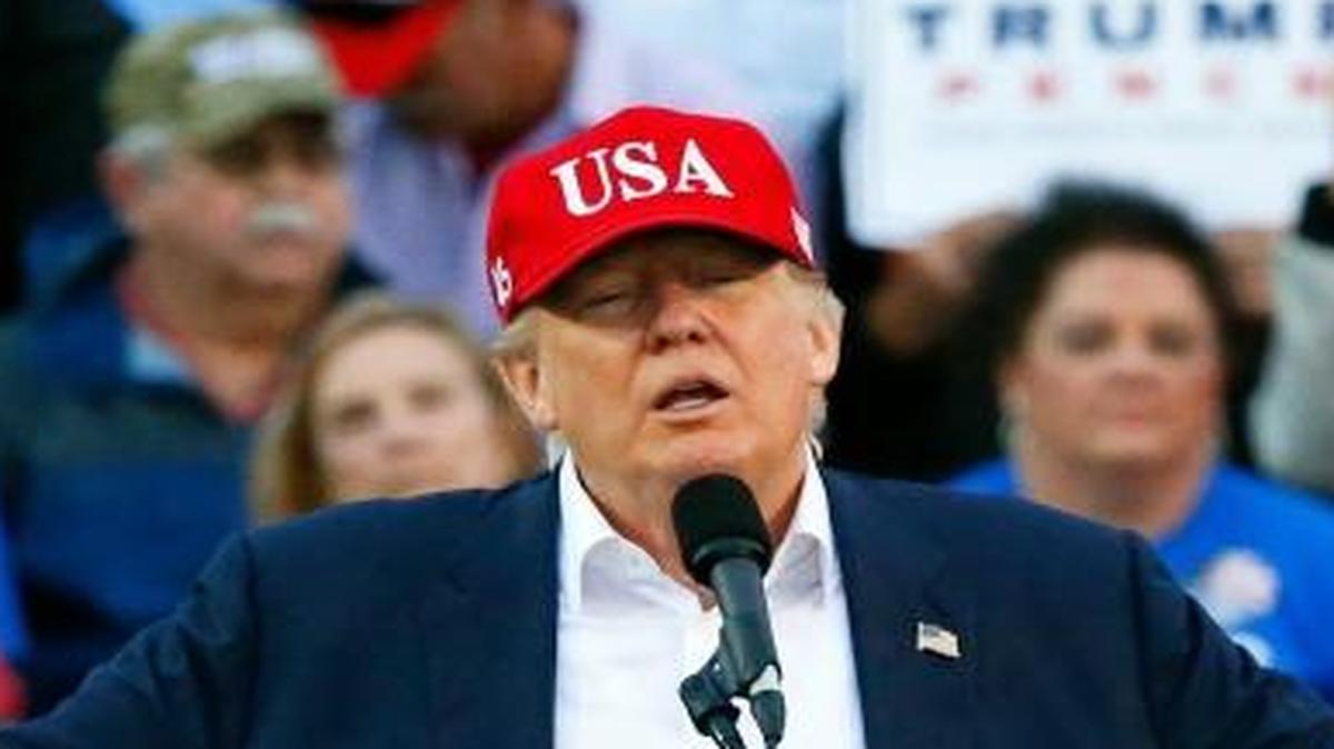 In this Dec. 17, 2016, photo, President-elect Donald Trump speaks during a rally at the Ladd Peebles Stadium in Mobile, Ala.