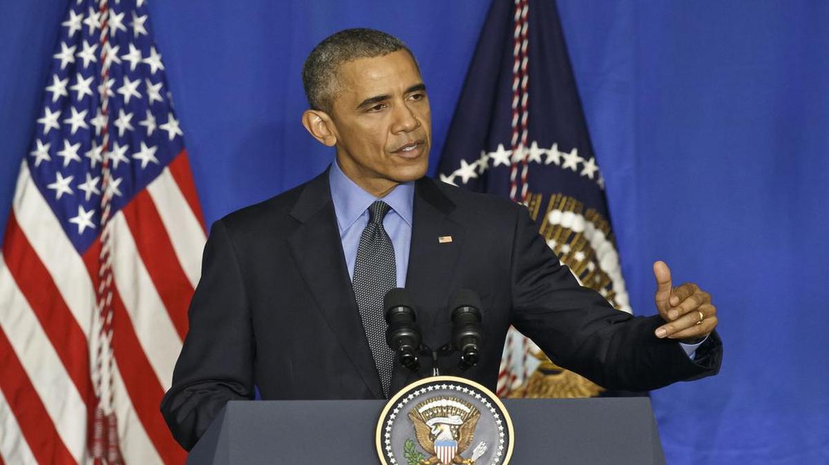 U.S. President Barack Obama discusses the climate change summit during a news conference at the Organization for Economic Cooperation and Development in Paris on Tuesday, Dec. 1, 2015.