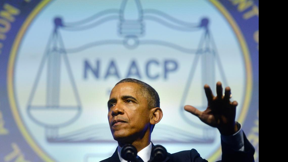 
President Barack Obama addresses the 106th annual NAACP national conference at the Pennsylvania Convention Center, Tuesday, July 14, 2015 in Philadelphia. 
