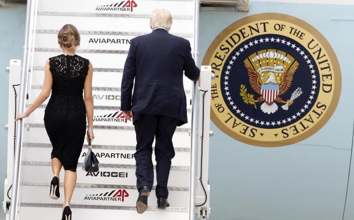 President Donald Trump and first lady Melania Trump board Air Force One to Brussels at the end of a two-day visit to Italy, which included a meeting with Pope Francis at the Vatican, at Rome’s Fiumicino international airport, Wednesday, May 24, 2017.