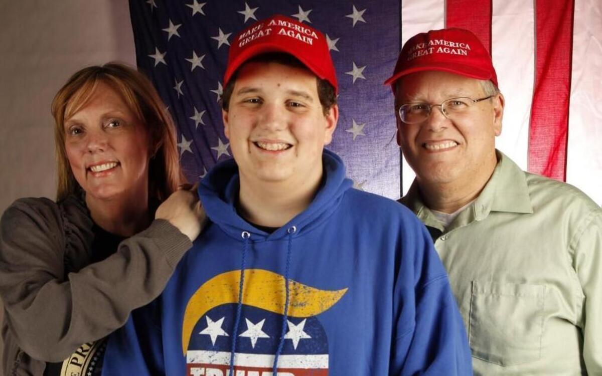 Paddy Olson, 13, is a huge Donald Trump fan. He and his parents, Kelly, left, and Allen, are headed to Washington, D.C. for the inauguration. Photo taken Jan. 17, 2017.