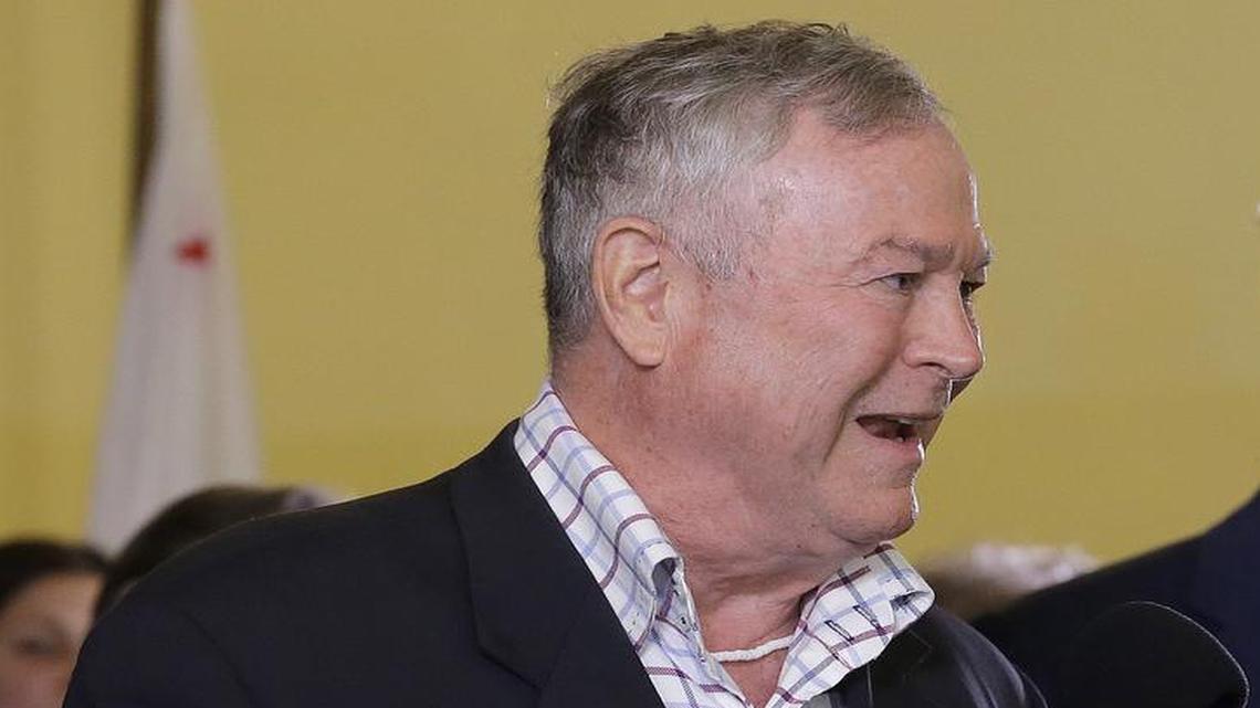 Rep. Dana Rohrabacher, R-Calif., left, speaks at a news conference in support of the Adult Use of Marijuana Act ballot measure in San Francisco, Wednesday, May 4, 2016. Rohrabacher is under consideration for secretary of state. (AP Photo/Jeff Chiu)