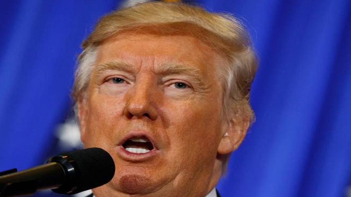 President-elect Donald Trump speaks during a news conference in the lobby of Trump Tower in New York, Wednesday, Jan. 11, 2017.