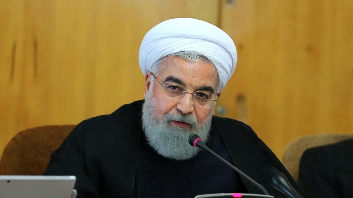 In this photo released by official website of the office of the Iranian Presidency, President Hassan Rouhani speaks during a cabinet meeting in Tehran, Iran, Wednesday, Wednesday, Oct. 11, 2017. Rouhani said if the U.S. backs out of the nuclear deal, "it won't be our failure at all, but a failure for the other side.