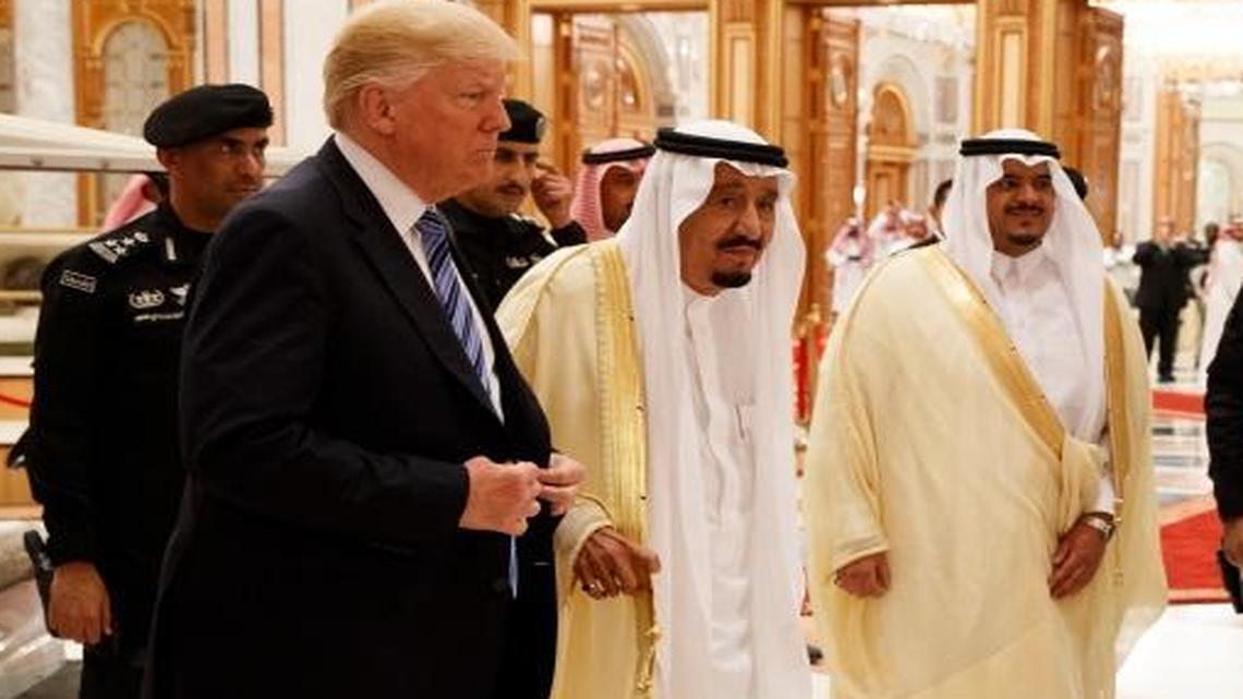 President Donald Trump and Saudi King Salman, center left, arrive at the Arab-Islamic-U.S. Summit at the King Abdulaziz Conference Center, Sunday, May 21, 2017, in Riyadh, Saudi Arabia.